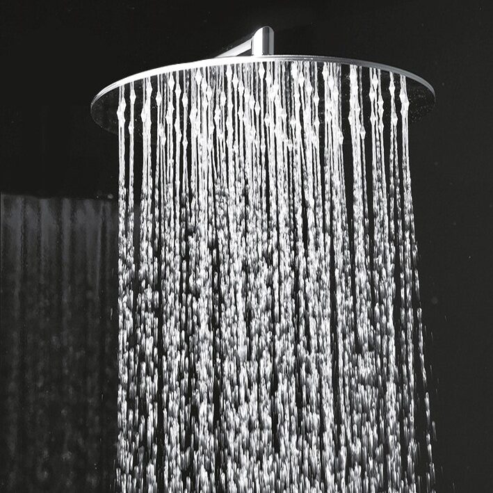 Shaped wall mounted shower head